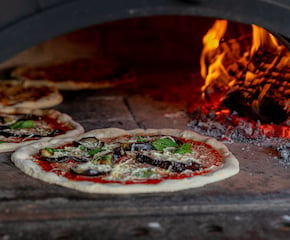 Freshly Baked Pizzas With Italian Style Toppings