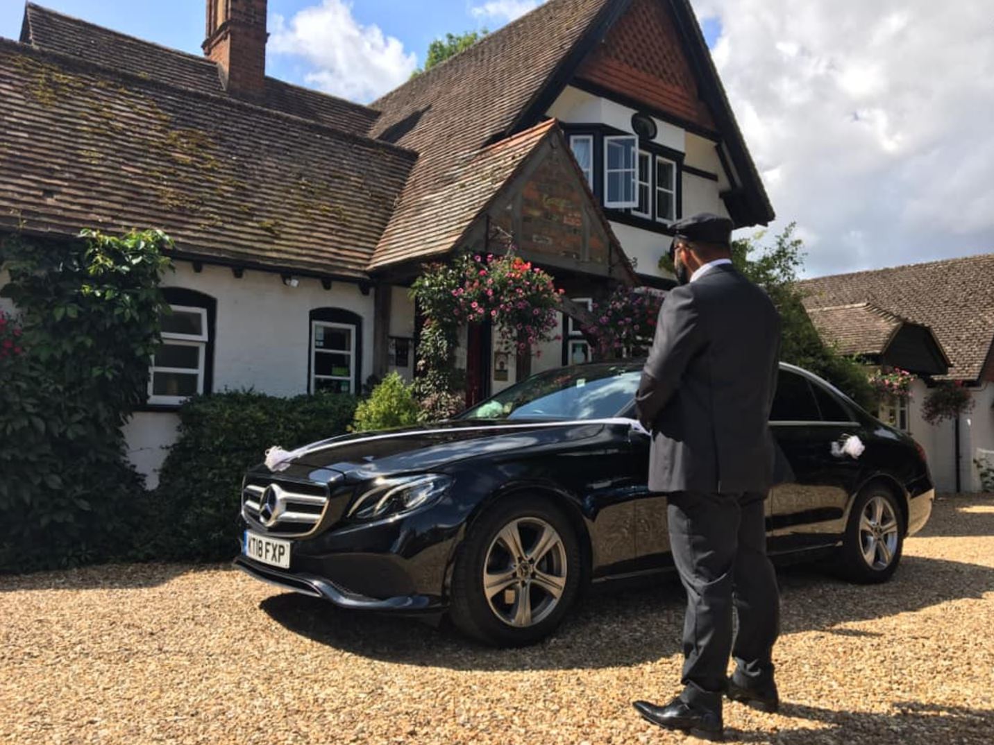 Travel in Style on Your Special Day in our Black Mercedes Benz E 220