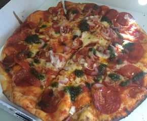 Freshly Cooked Pizza Served From Our Original "Oggies" Van