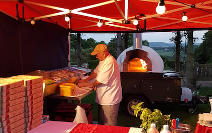 Freshly Wood-Fired Pizzas Lovingly Prepared For You And Your Guests