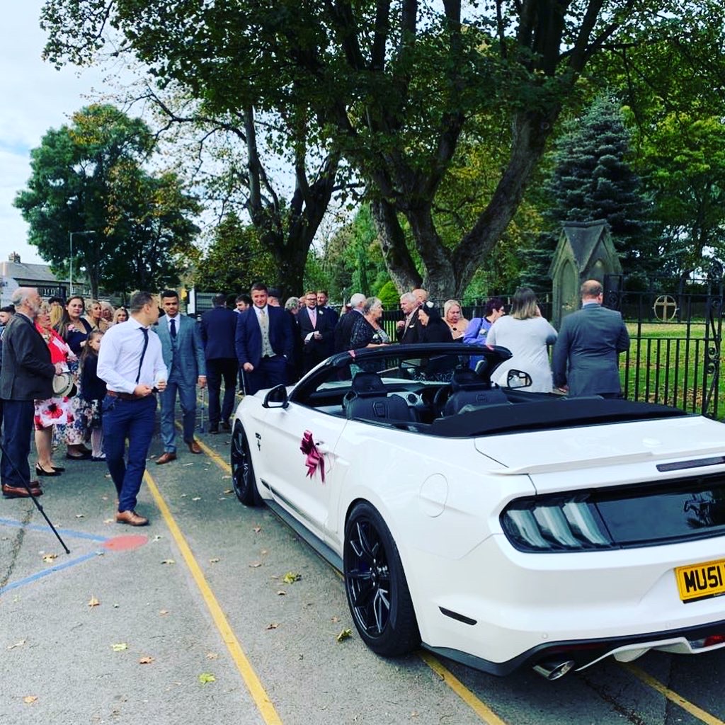 Arrive in Style in White Convertible Mustang GT