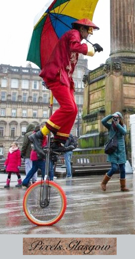 Oriental Themed Uni Cyclist & Stilt-Walker