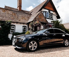Travel in Style on Your Special Day in our Black Mercedes Benz E 220