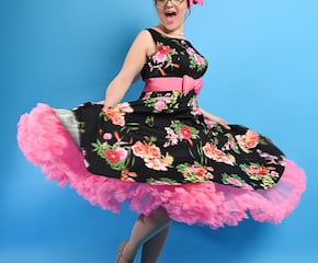 Ruby Rockabella Performing Upbeat Songs in Authentic 1950s Costume