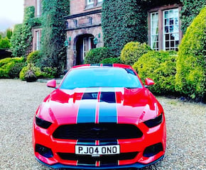 Arrive in Style In This Mustang GT In Red With  Black Stripes