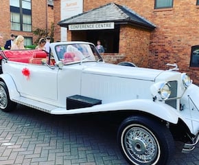 Arrive in Style in Stunning Convertible Beauford Car
