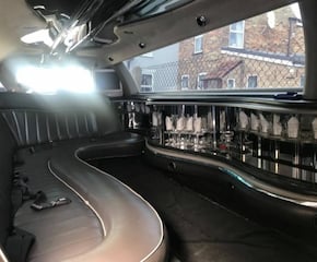 Arrive in Style with a Sleek White Stretch Limo