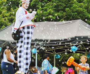 Professional Stilt Walkers Literally Standing Above The Crowd