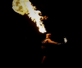 Fire Dancer Performing Fire Burning, Eating & Breathing