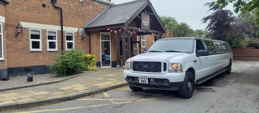 Arrive In Style In Gorgeous Dazzling White   13 -Seater Limo